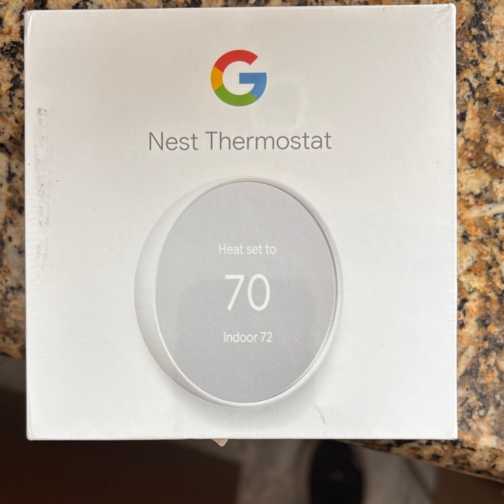 Google Nest Thermostat in White and Gray